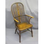 CIRCA 1830 ELM WINDSOR ELBOW CHAIR with pierced splat and spindle back on a H stretcher, 11cms H,