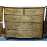 GEORGIAN MAHOGANY BOW FRONT CHEST of two short over three long drawers on bracket corner feet,