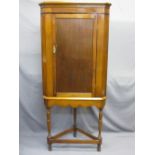 CIRCA 1900 SINGLE DOOR CORNER CUPBOARD ON STAND with turned supports, 178.5cms H, 77cms W