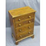 NEAT MAHOGANY CHEST OF FOUR DRAWERS with turned wood knobs on ogee corner bracket fee, 74cms H,