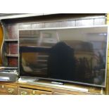 SAMSUNG SMART CURVED TV 55in model No VE55JS8500 and a Panasonic blue ray player E/T