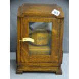 VINTAGE OAK SMOKER'S CABINET with wooden tobacco jar and pipes to the interior, 32cms H