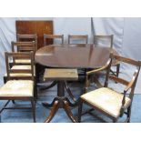 GOOD REGENCY MAHOGANY TRIPLE PEDESTAL DINING TABLE and seven (six plus one) chairs, one additional