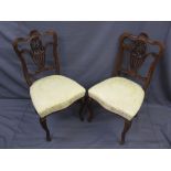 PAIR OF CIRCA 1900 WALNUT SALON SIDE CHAIRS with good carved back detail, 91cms H