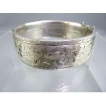 SILVER BANGLE with chased half decoration, London 1963, 2 troy ozs