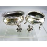 CIRCULAR SILVER SALT ON THREE PAD FEET, 1.7ozs, marks indistinct, an oval silver salt, 1.3ozs,