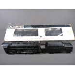 LIONEL ELECTRIC TRAINS O'GAUGE - a boxed Rock Island 0-4-0 locomotive and tender, Cab No 673 and