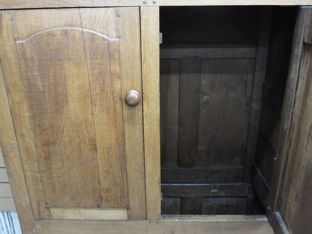 CIRCA 1820 OAK PRESS CUPBOARD, peg joined construction with shaped panel upper doors and panel sides - Image 2 of 2