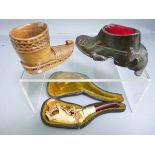 CASED MEERSCHAUM PIPE carved in the form of a hand holding an oak leaf branch with amber mouthpiece,