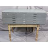 FIVE DRAWER PLAN CHEST supported on a vintage turned leg table base, 115cms H, 147.5cms W, 89cms D