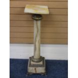 VINTAGE ONYX & BRASS COLUMN STAND on a stepped square base with paw feet, 102cms H
