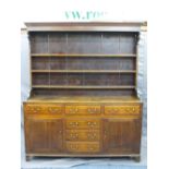 NORTH WALES OAK DRESSER CIRCA 1820, canopy three shelf rack with wide back boards and shaped side