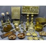 BRASSWARE - an assortment including candle holders, jam pans, fire dogs, a gong, copper candlesticks