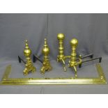 BRASS FIRE DOGS, two substantial pairs, 52cms H and 51cms H, and a brass fender