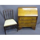 MAHOGANY BUREAU with string inlay detail on bracket feet and an antique mahogany dining chair