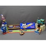 TIN PLATE TOYS, boxed, including a steam locomotive, clown drummer, road roller ETC