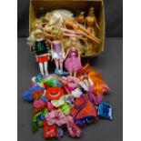 MATTEL BARBIE DOLLS - an assortment and a parcel of clothing