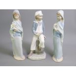 LLADRO - three figurines, girl with a shawl and flowers (two) and a young sailor boy