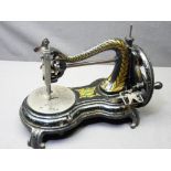 VINTAGE JONES HAND CRANK SEWING MACHINE on a shaped base with decorative gilt detail