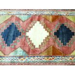 IRAN 100% WOOL PILE RUG - multi-coloured central block pattern and multi-bordered edge, 191 x