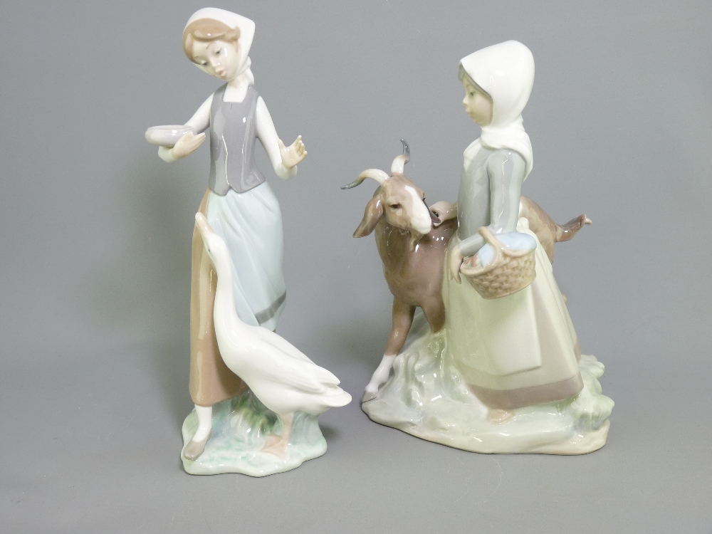 LLADRO - figurine of a bonneted girl feeding geese and another girl with a goat