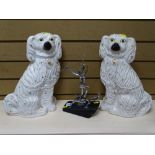 ART DECO STYLE METALLIC FIGURINE OF A LADY & HUNTING DOGS on a sloped wooden base, 33cms H and a