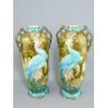 MINTON SECESSIONIST VASES, a pair, designed by Leon Solon, vibrant peacock design with lustre and