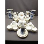FIVE GRADUATED BLUE & WHITE JUGS with a fruit decorated continental part teaset and other teaware