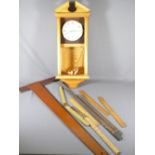 KNIGHT & GIBBINS OF LONDON MODERN PINE PENDULUM WALL CLOCK and a quantity of vintage rules ETC