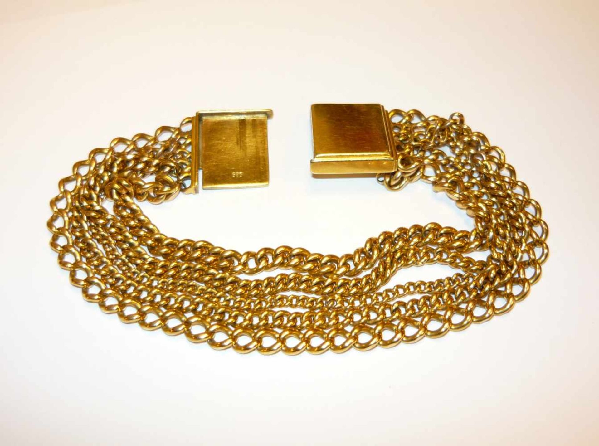 Fünfreihiges Kettenarmband mit großer Schließe. 585er GG (14K). Gew. ca. 52 g. Five row chain