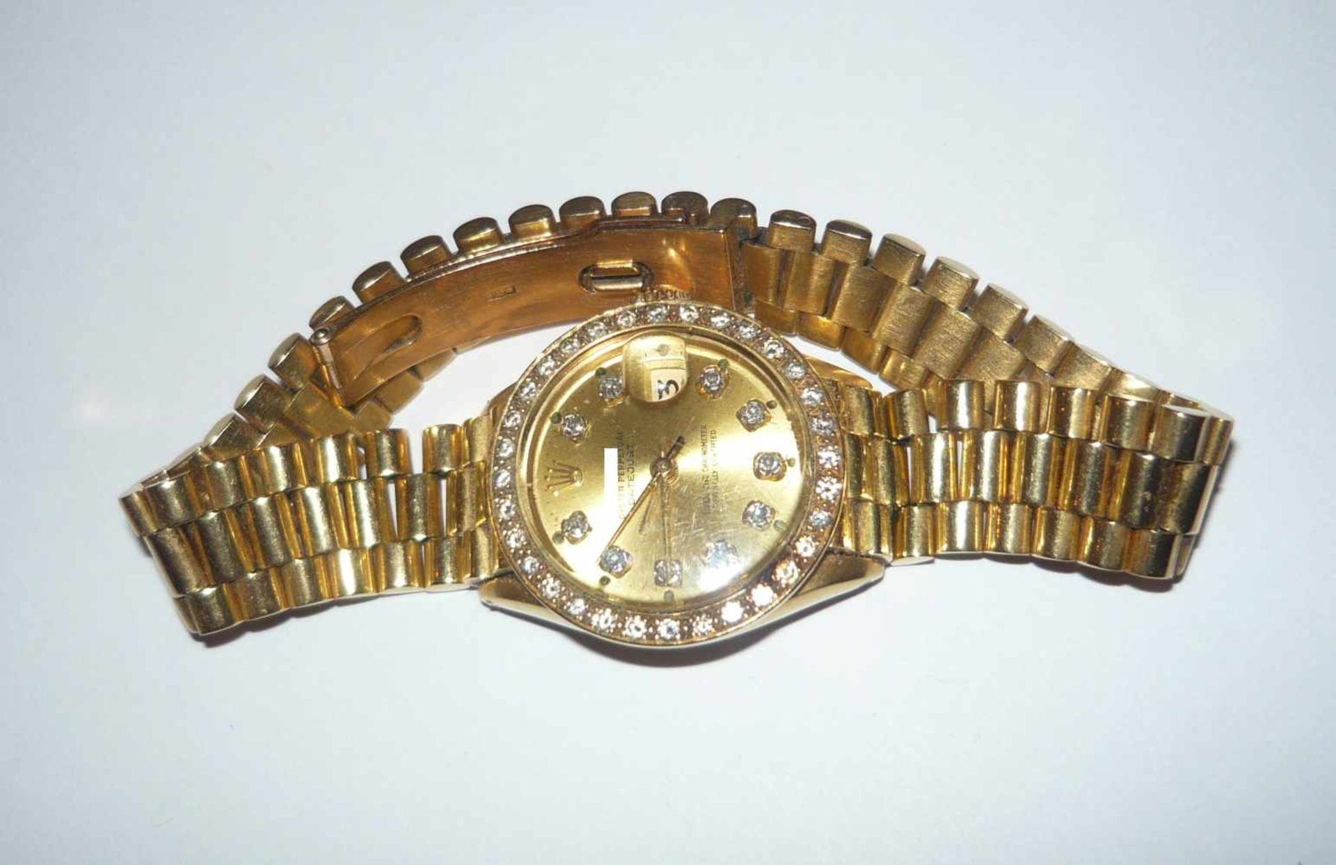 Vintage Brillantuhr. 750er GG (18K). Ziffernblatt im Rolex-Stil. Werk läuft gut, jedoch ohne