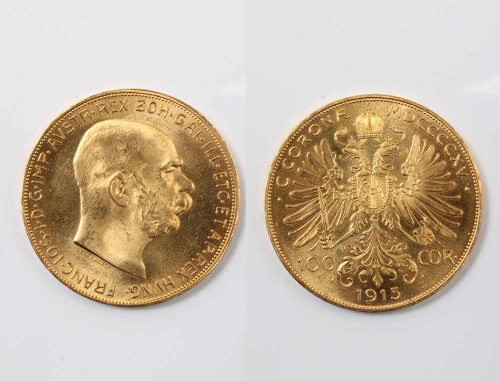 Münze. 100 Corona/KronenAvers doppelköpfiger, gekrönter, österreichischer Wappenadler mit Schwert