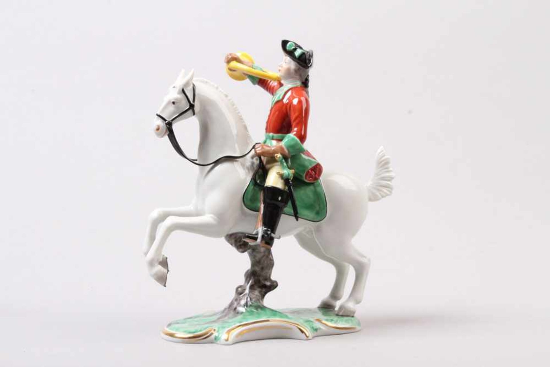 Porzellanfigur.Nymphenburg 20. Jh. Reiter mit Horn. Figur aus der "Nymphenburger Roten Jagd"