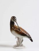 Schnepfe.20. Jh. Porzellan, naturalistisch bemalter Vogel. Marke Ens, Nr. 7485. H: 22 cm.- - -20.