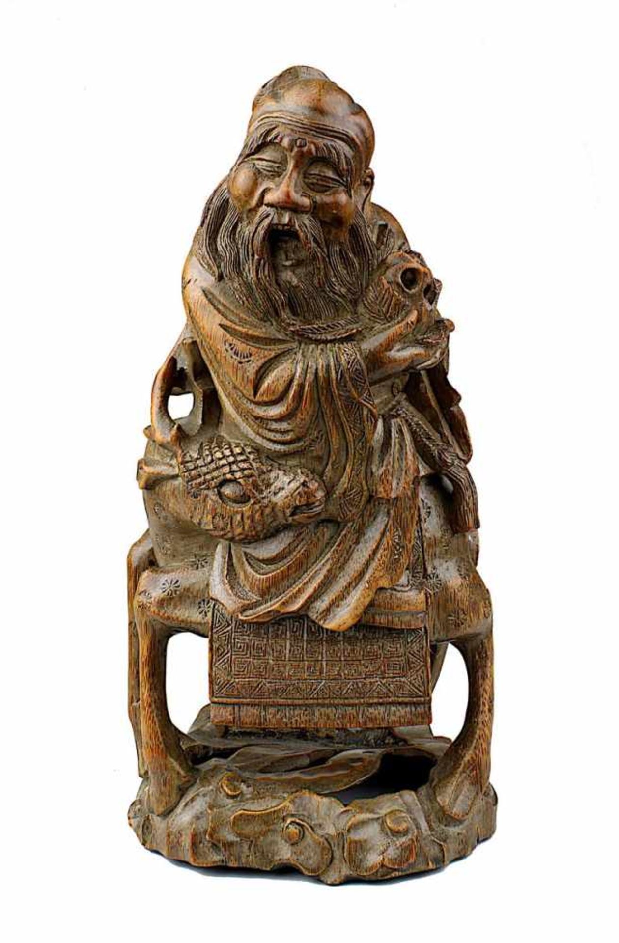 Shou Lao, auf einem Hirsch reitend, China um 1900, fein geschnitzte Holzfigur des bärtigen Gottes
