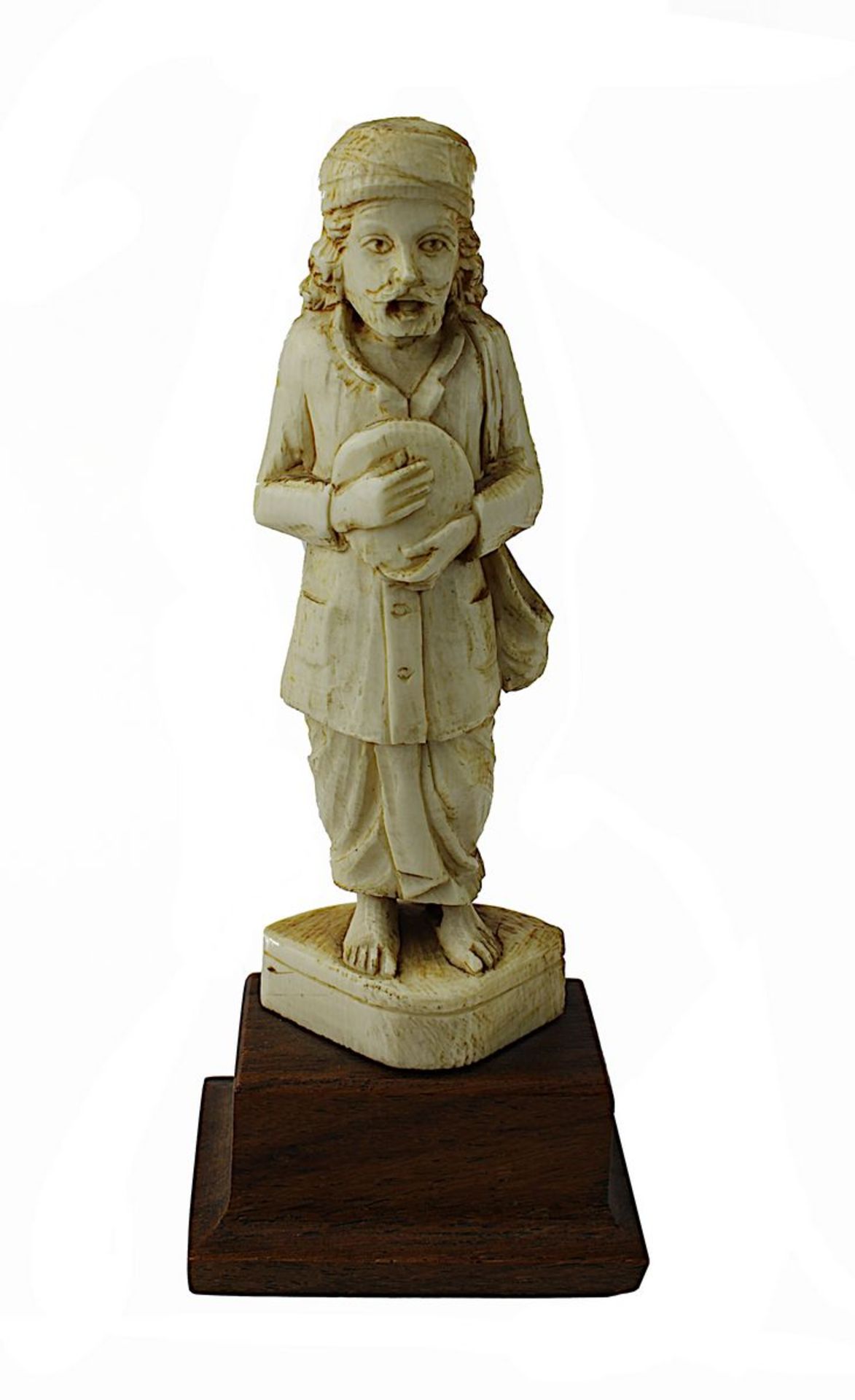 Kleine indische Elfenbeinfigur eines Bettlers, um 1900, aus einem Stück geschnitzt und auf