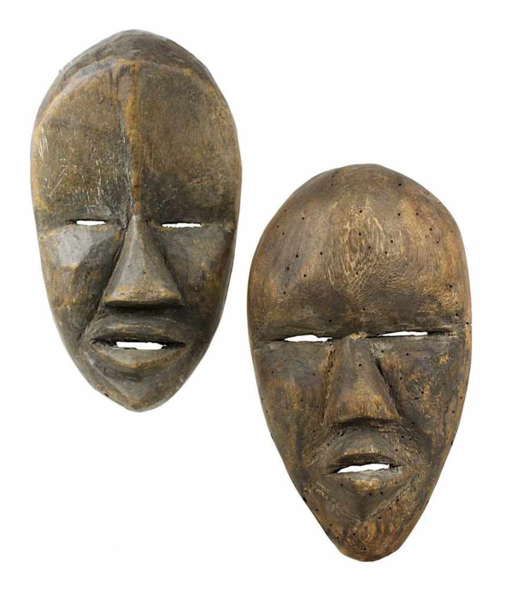 2 Initiations-Masken deangle der Dan, Côte d'Ivoire, Holz geschnitzt und mit Spuren von Kaolin,