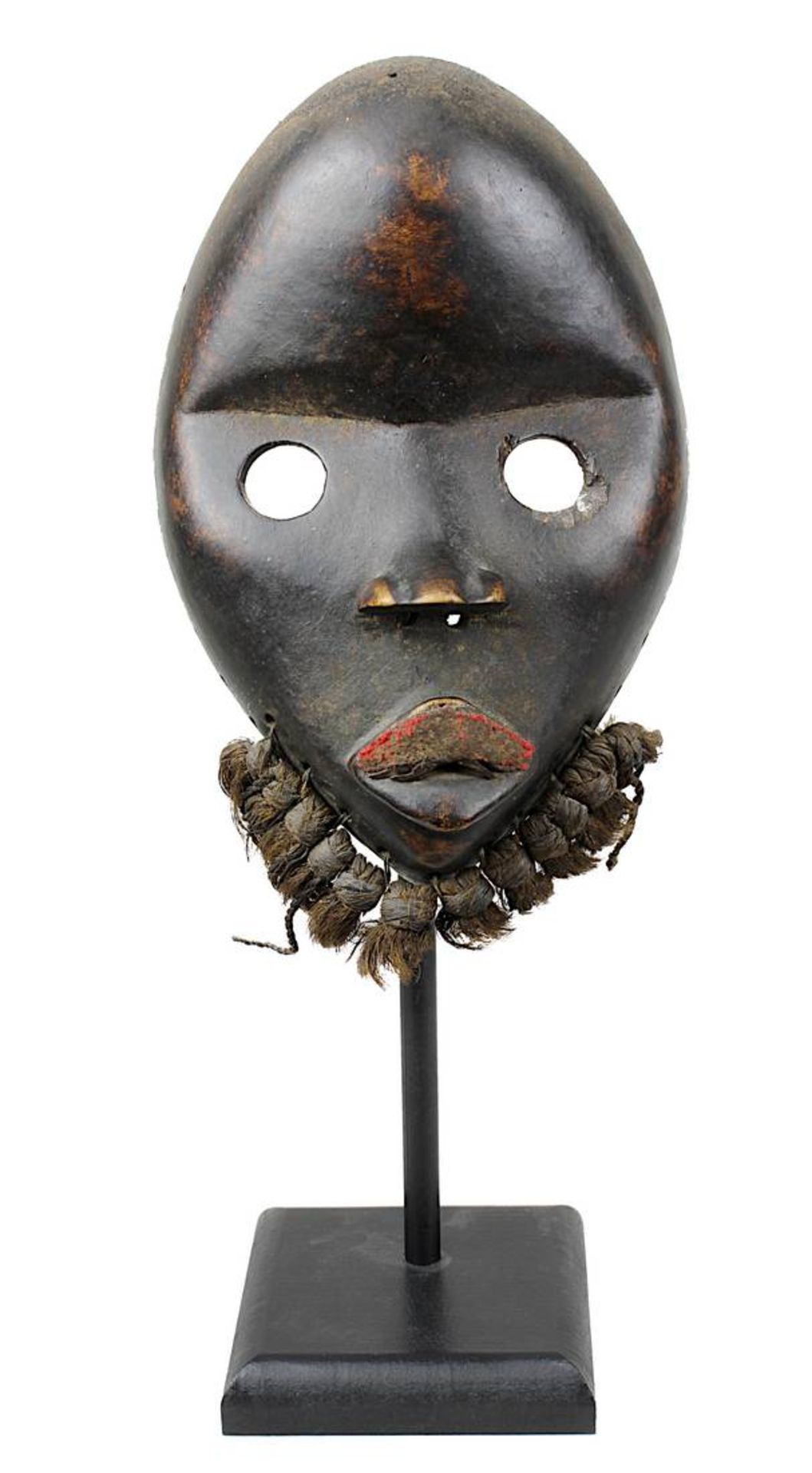 Alte Maske zakpai der Dan, Côte d'Ivoire, Holz geschnitzt mit dunkler schimmernder Patina, ovales,