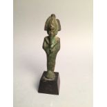 Statuette en bronze représentant le Dieu OSIRIS. - Hauteur 114mm. - Egypte, [...]