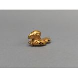 COLOMBIE. Civilisation Taïrona. Bijou-pendentif figurant un toucan. Bas or. L : 4.2 [...]