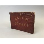 Album de photographies sur Pompéi, daté 1874. 47 photos collées sur papier. 10.5 x [...]