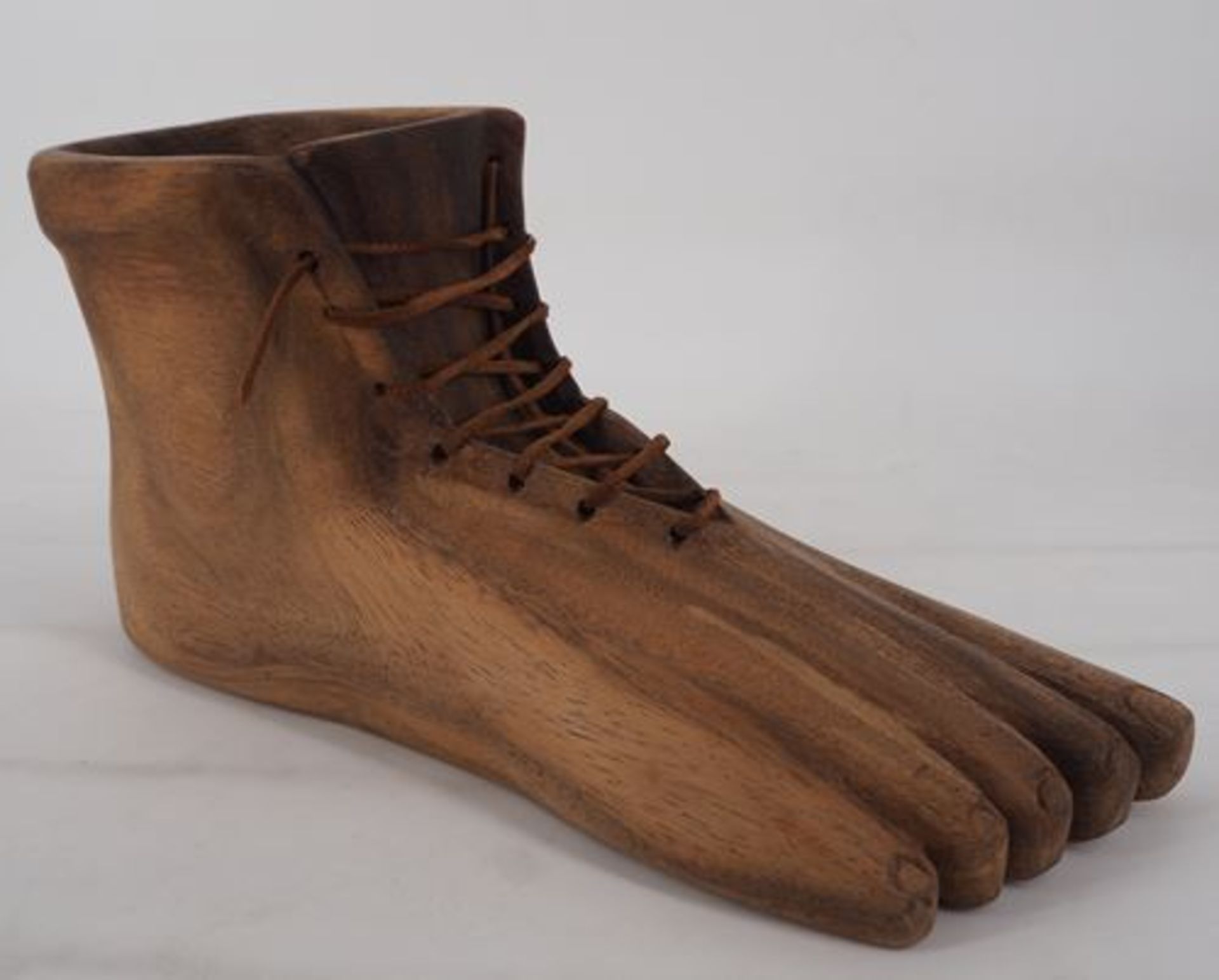 René Magritte (1898-1967) (after) Foot Wood and leather sculpture Signed and [...]