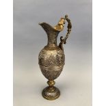 CUGNY. Aiguière à une anse sur piédouche en bronze double patine à riche décor [...]