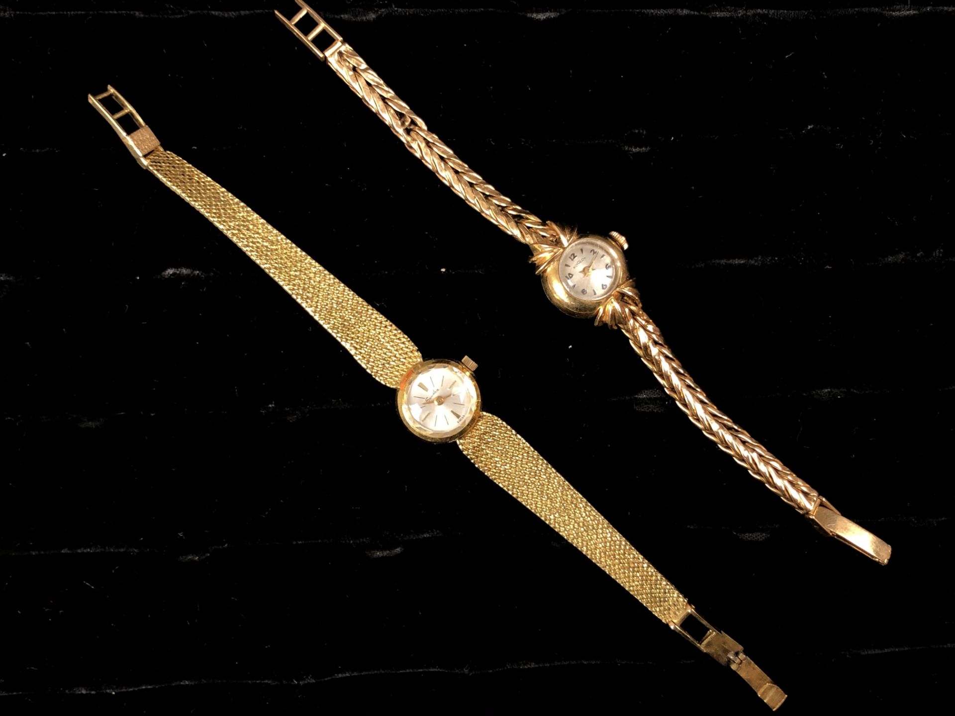 Deux montres dames (SANDOZ et MAZELOR) en or. P. total : 40 g. -