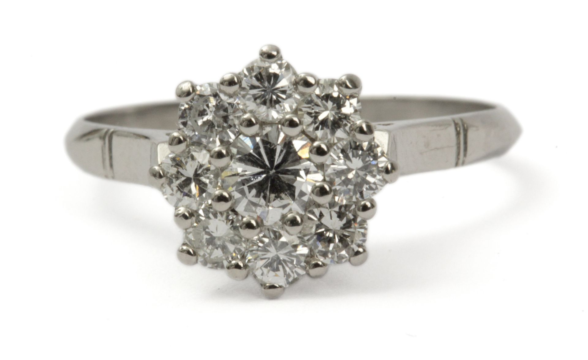 Diamond cluster ring with a platinum setting