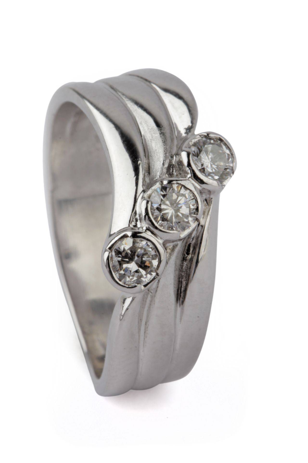 Brilliant cut diamonds three stone ring with an 18 k. white gold setting