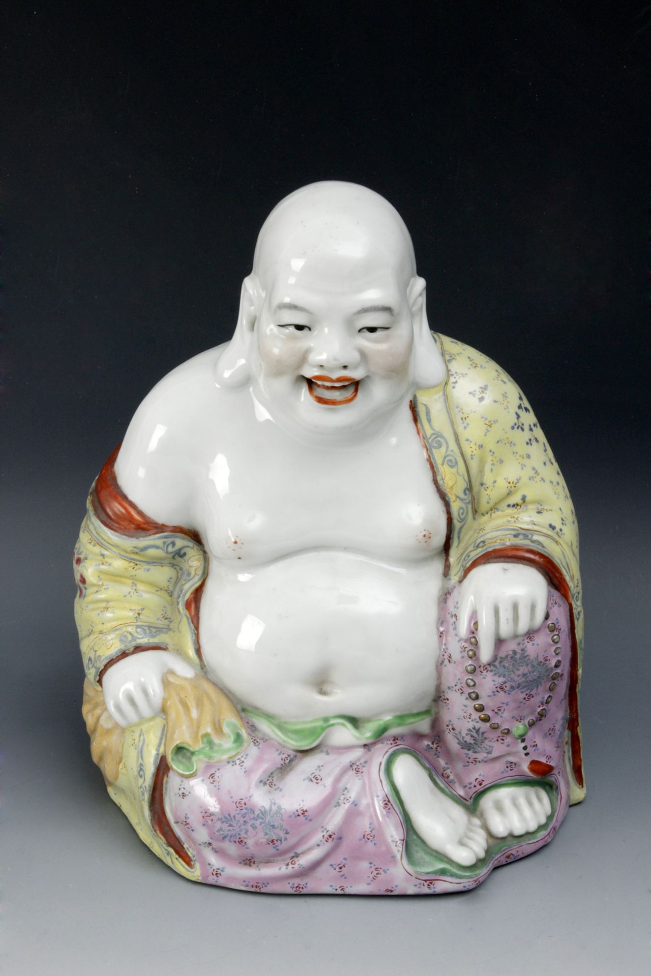 A 20th century Chinese Republic period Chinese Famille Rose porcelain figure of Buddha