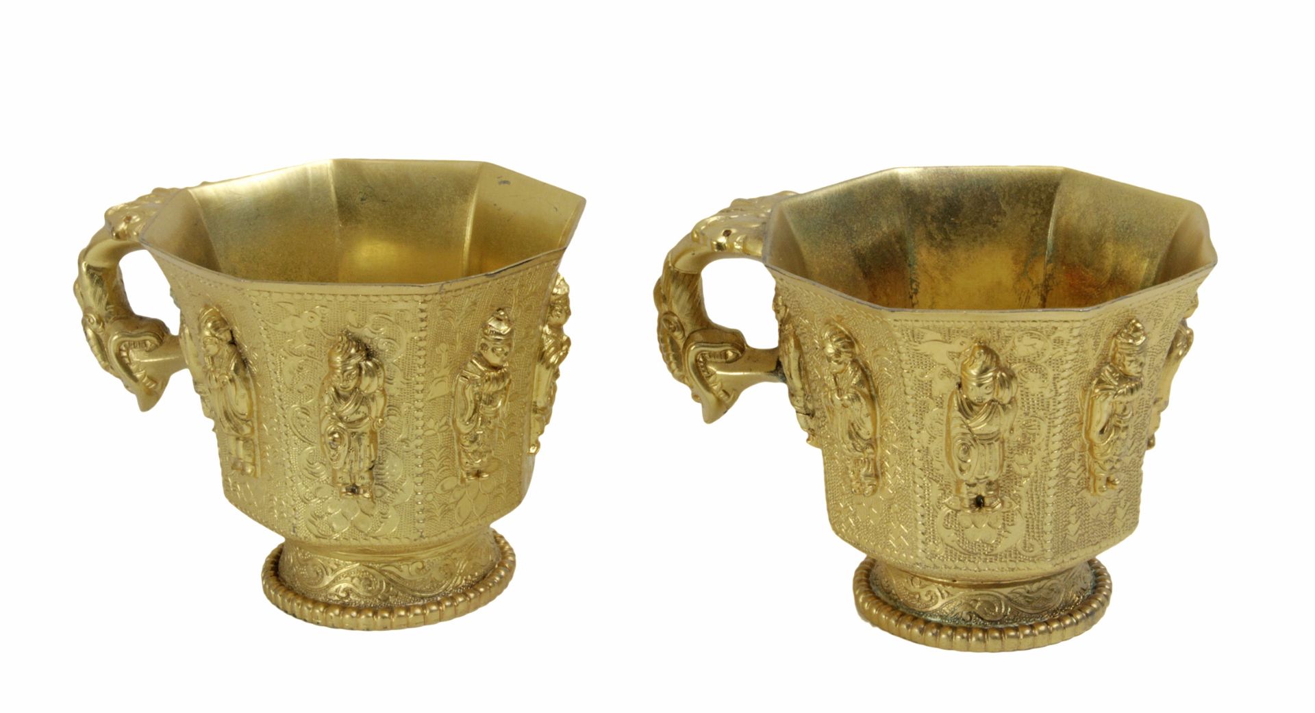 A pair of 20th century gold plated silver cups