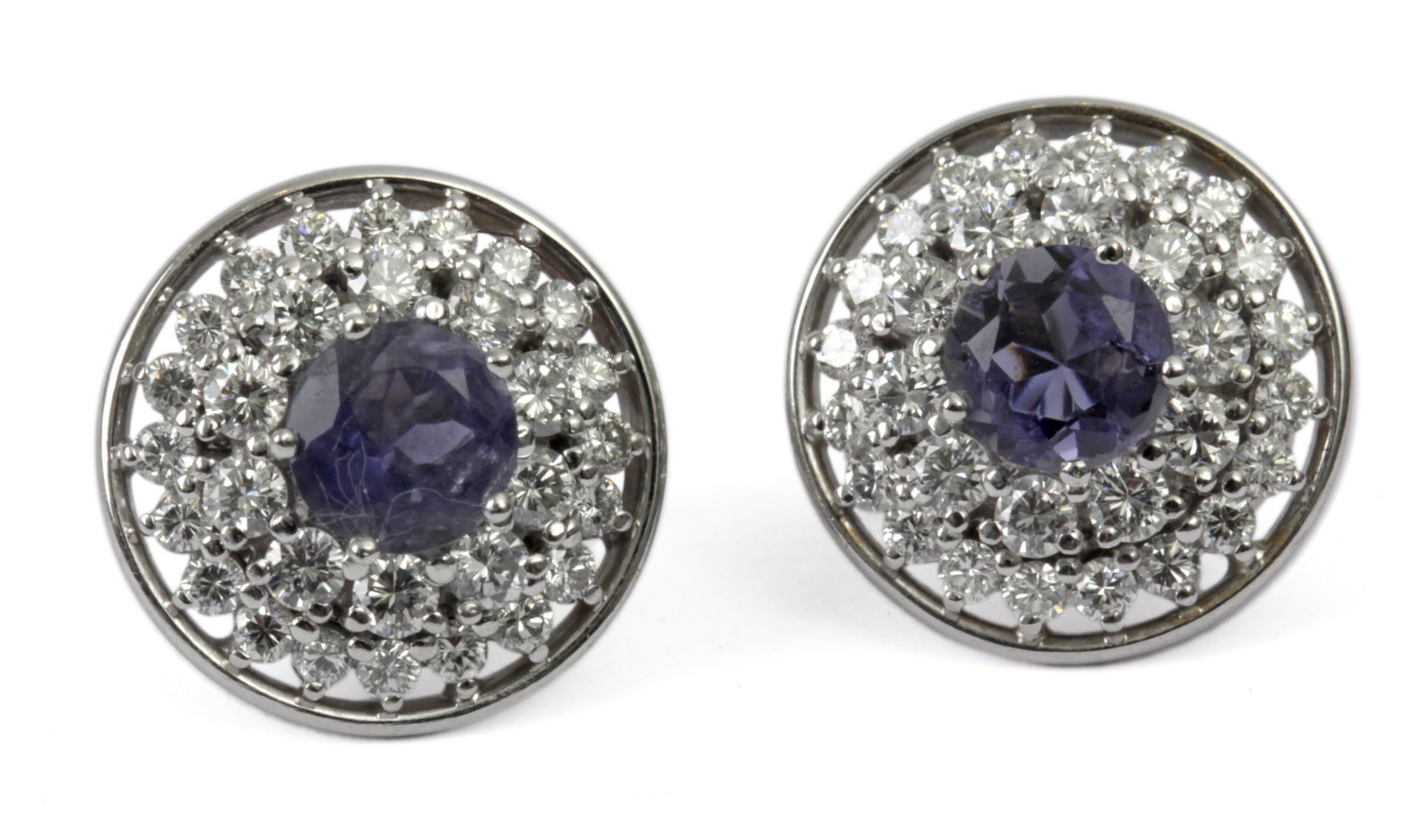 A pair of iolite and diamond cluster earrings with an 18k. white gold setting