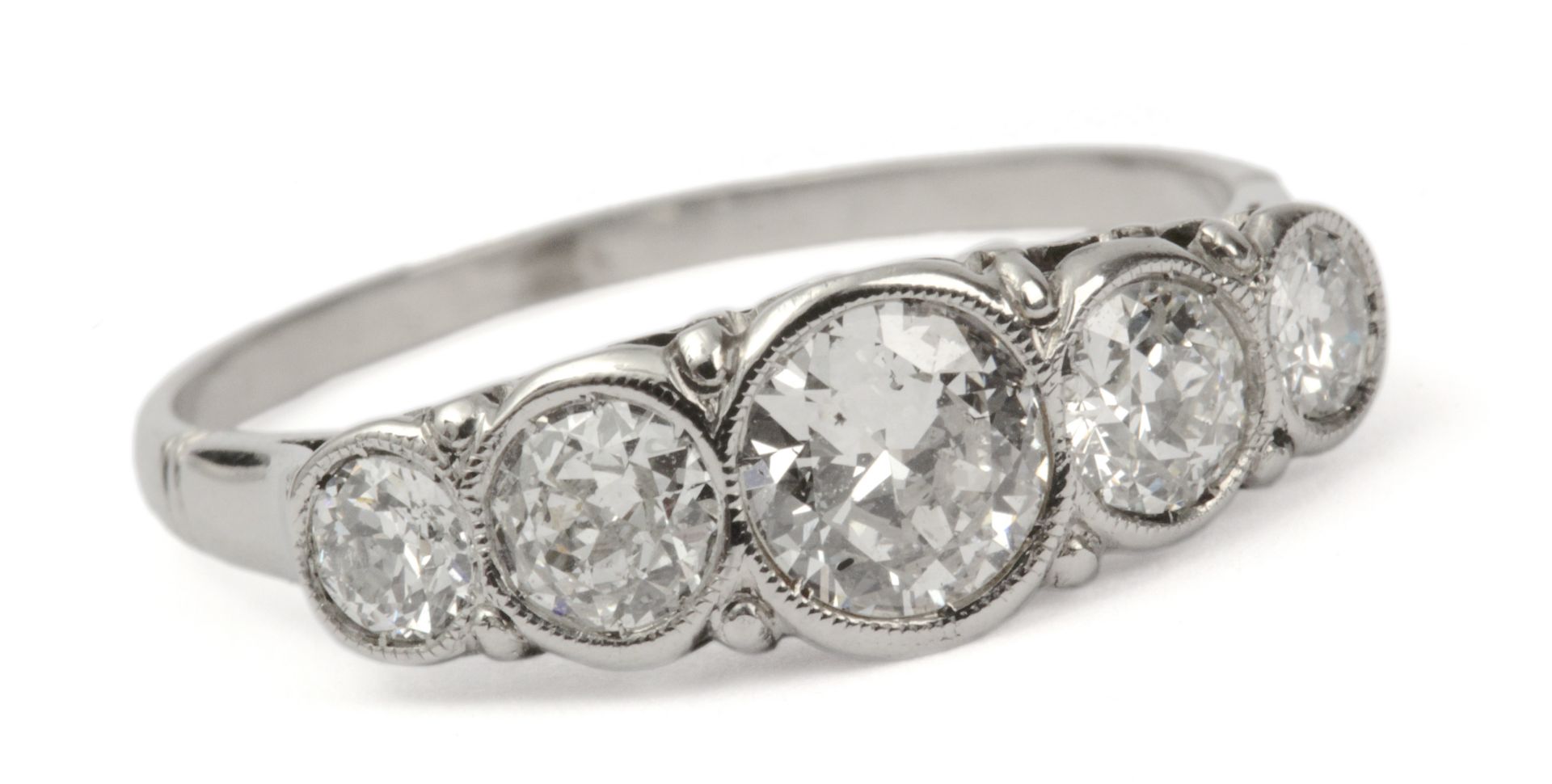 Brilliant cut diamond five stone ring with a platinum setting